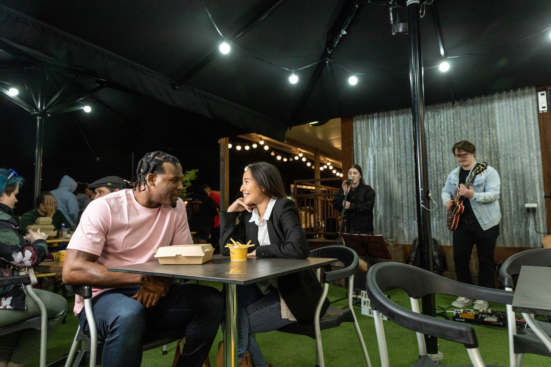 a couple enjoying live music at a venue