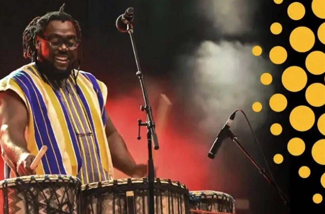 Man playing drums on stage