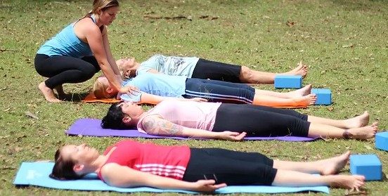 Women lay on yoga mats