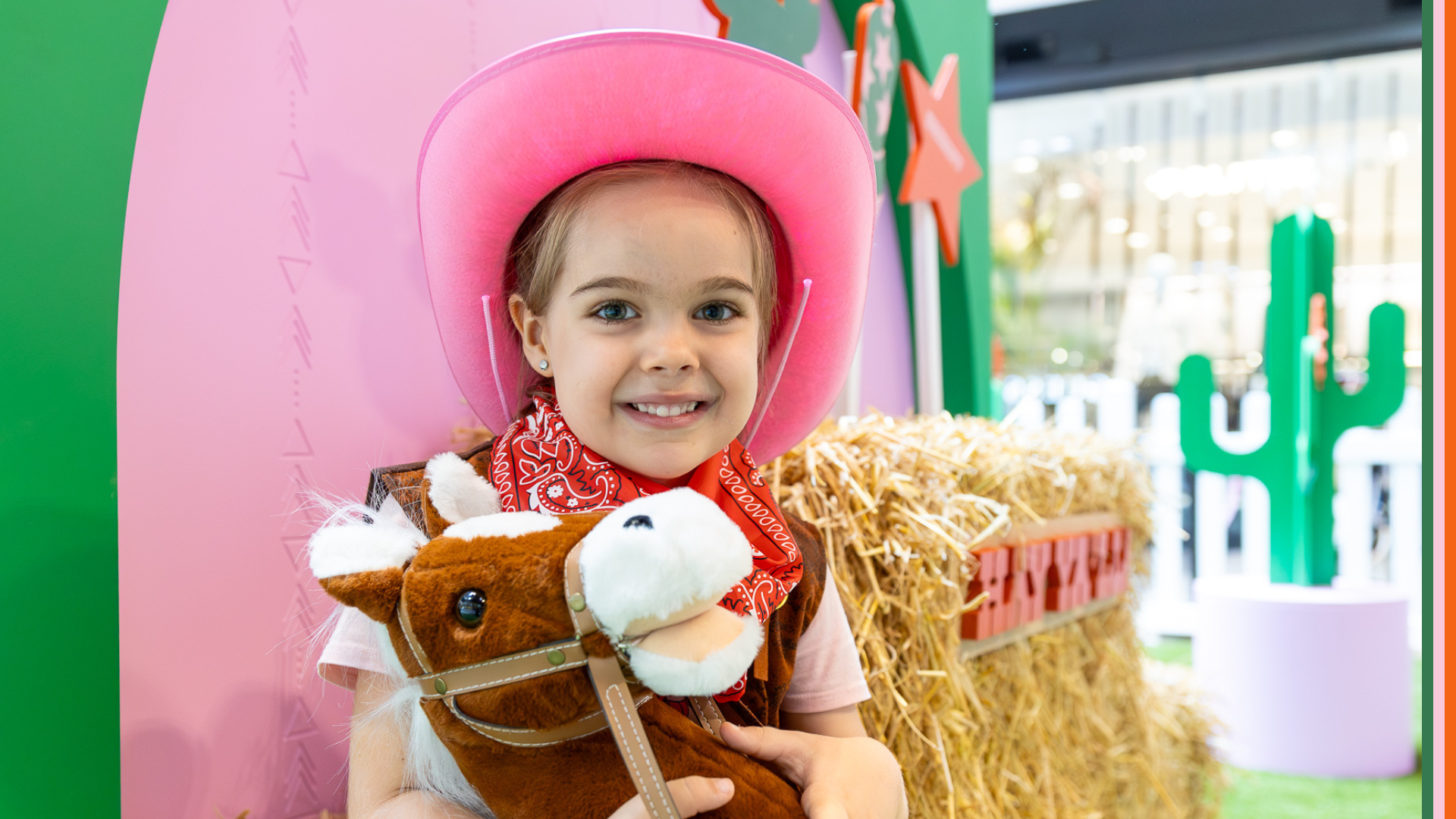 little girl wearing cowgirl costume