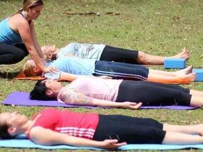Women lay on yoga mats