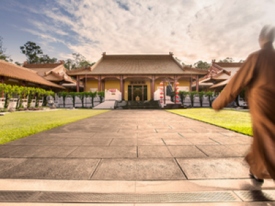 Monk walking at Chung Tian Temple